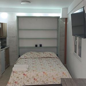 Estudio con Cama Queen